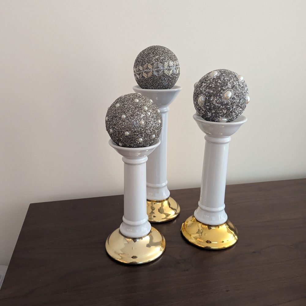 Chic White and Gold Candle Holders with Decorative Spheres